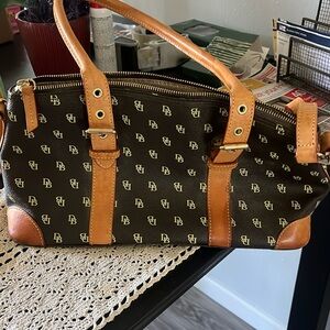 Purse.Has handle and shoulder handle. Some minor stains. Overall good condition.